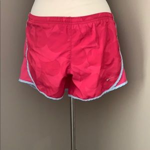 Pink Nike running shorts